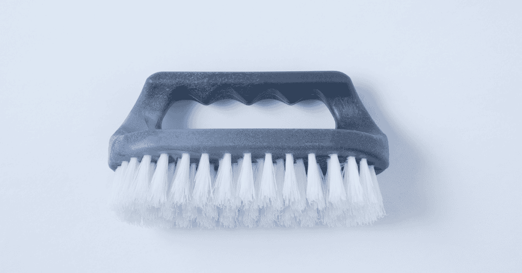 Using a Vacuum and Stiff Brush