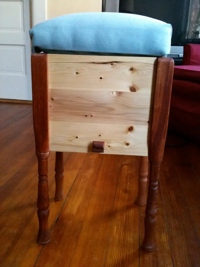 Footstool With Sliding Storage Section